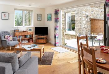 The open plan living space is ideal for spending quality time together.