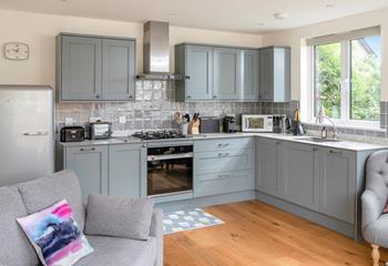 The kitchen has all the appliances needed to cook delicious meals.