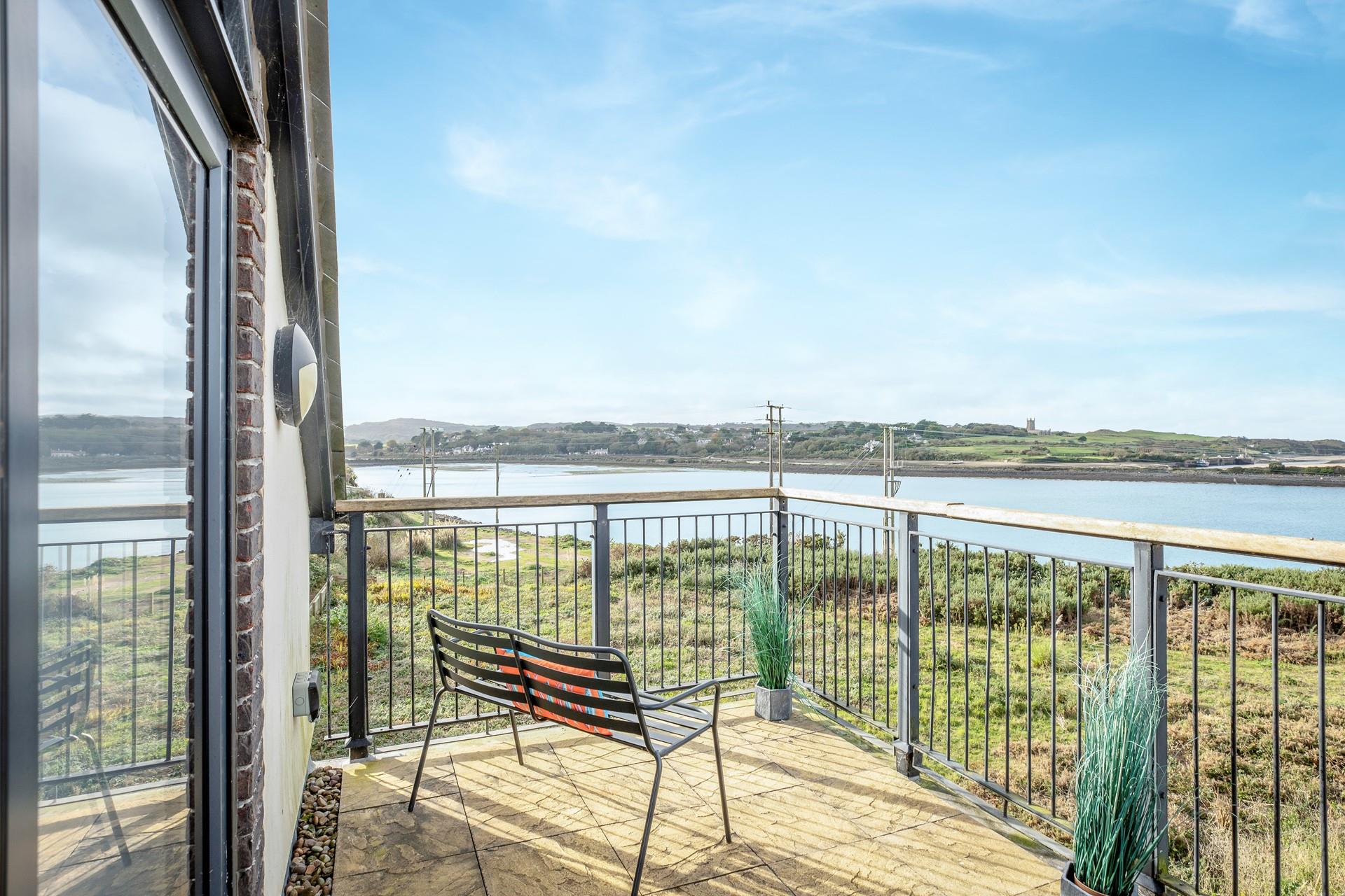 Sit and relax on the balcony enjoying the views.