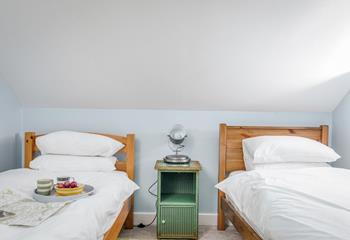 Bedroom 3 is simply decorated and a calming space to relax.