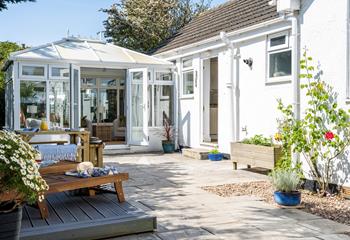 Lay out on the sun loungers on a sunny afternoon in the garden.