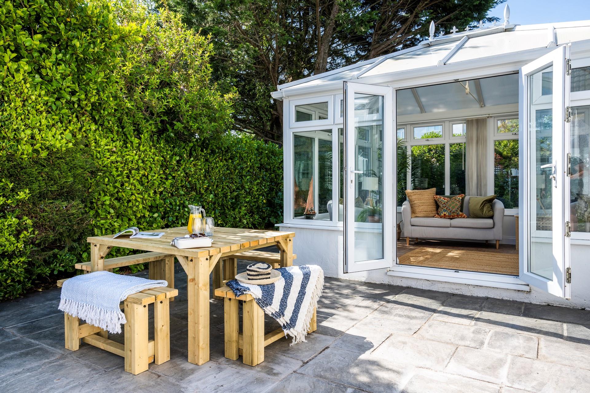 Enjoy al fresco dining in the suntrap garden.