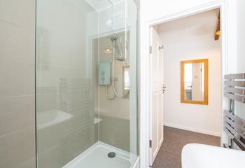 Warm fluffy towels can be taken straight from the heated towel rail.