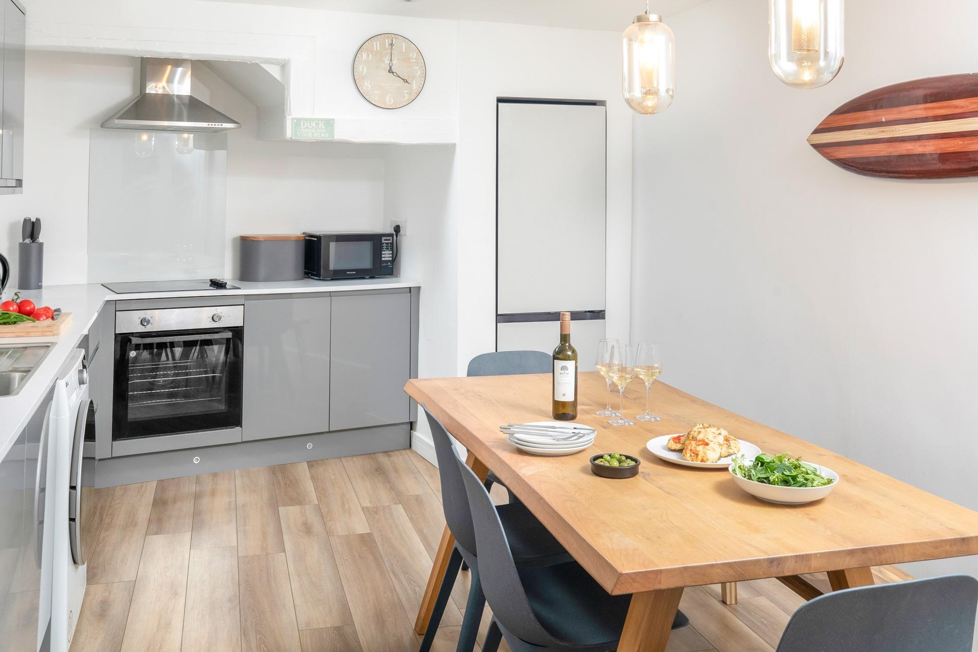 The kitchen is modern and sleek for rustling up a delicious meal.