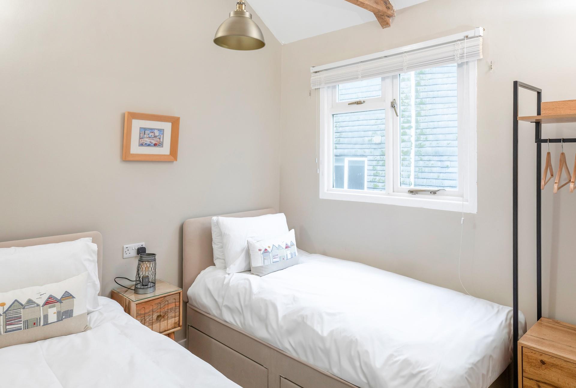 Twin beds in bedroom 1 are perfect for children and young adults.