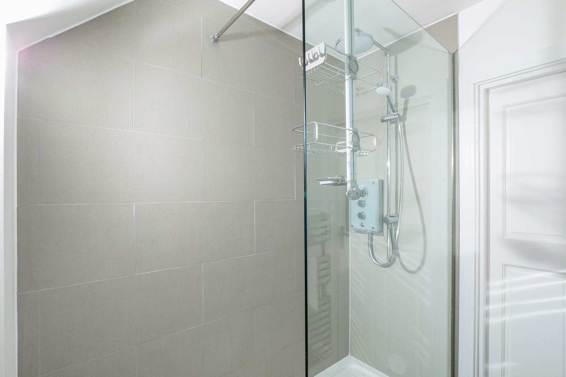 Start the day under the invigorating rainfall shower.