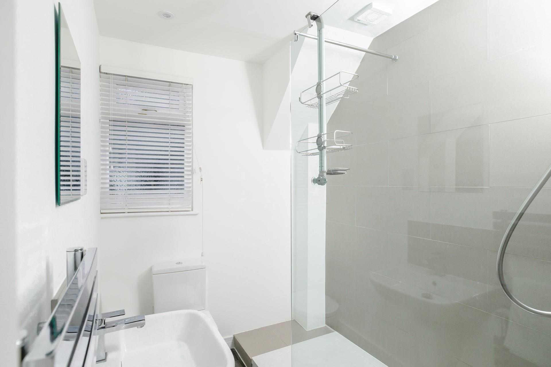 Warm fluffy towels can be taken straight from the heated towel rail.
