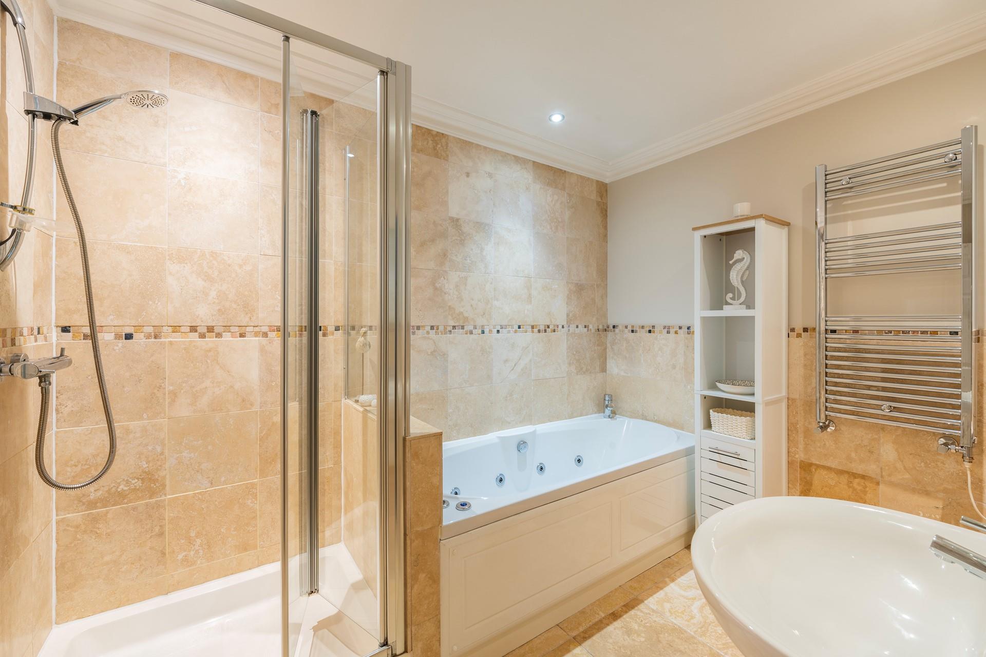 Take a soak in the luxurious whirlpool bath and unwind in the bubbles.