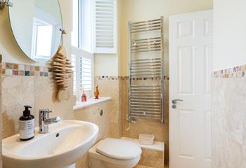 Take warm fluffy towels straight from the heated towel rail after a morning shower.
