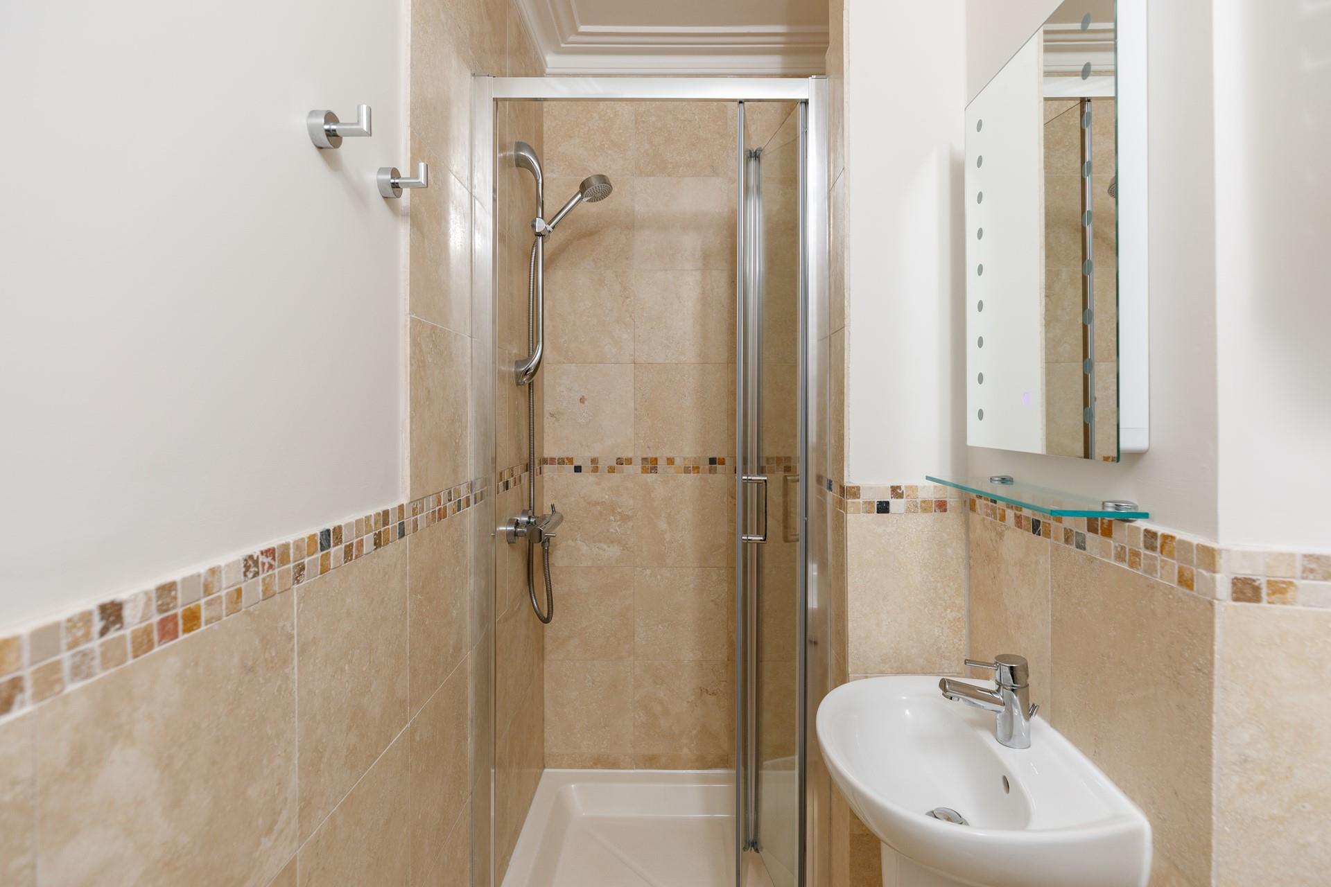 Start the day with a refreshing shower and wrap yourself in the large, fluffy bath towels provided.