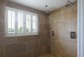 The wetroom has a double rainfall shower for rinsing off after dips in the sea.