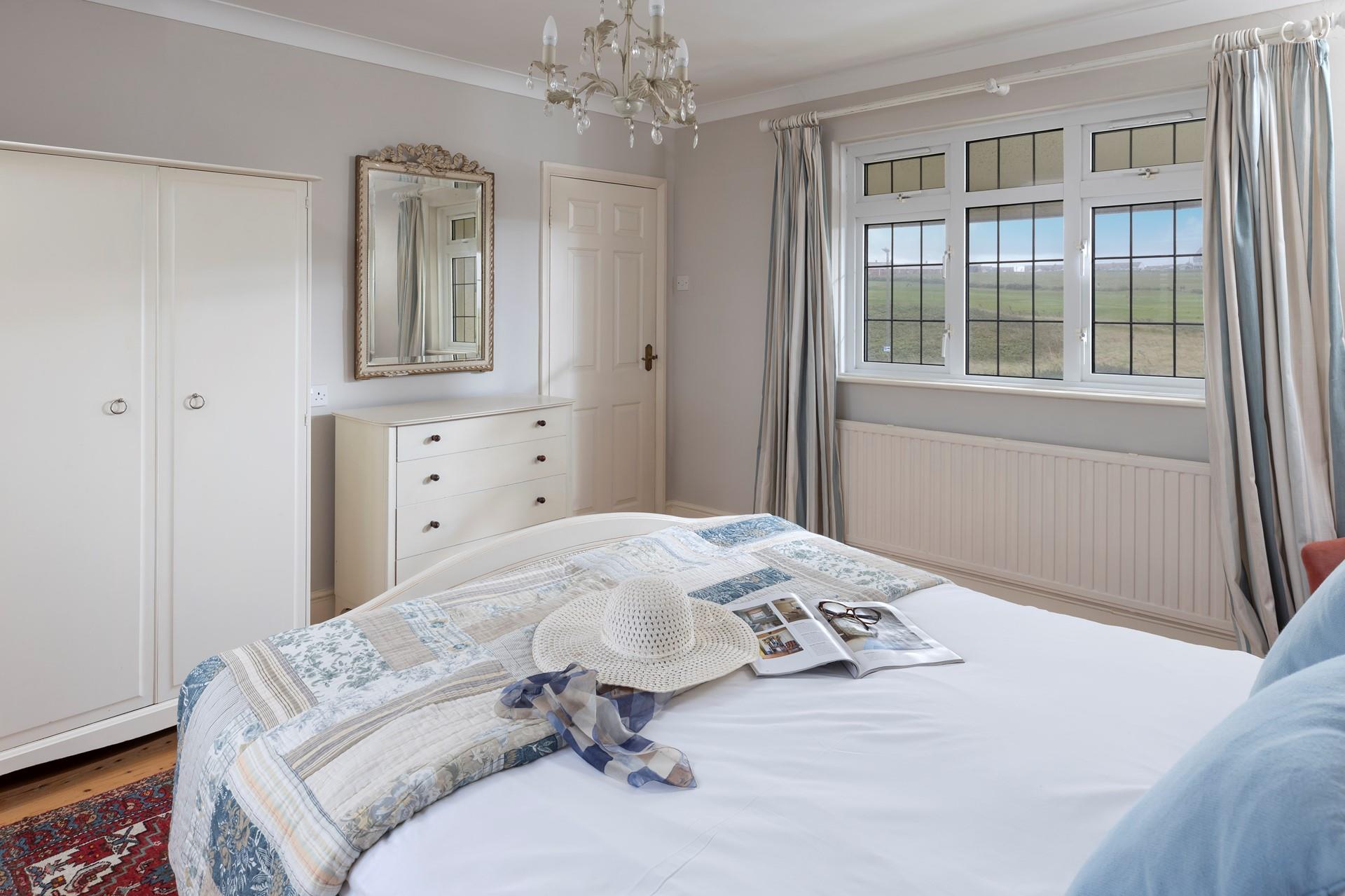 Ocean blues create a calming space to relax.