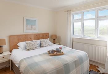 Wake up to views across the golf course each morning.