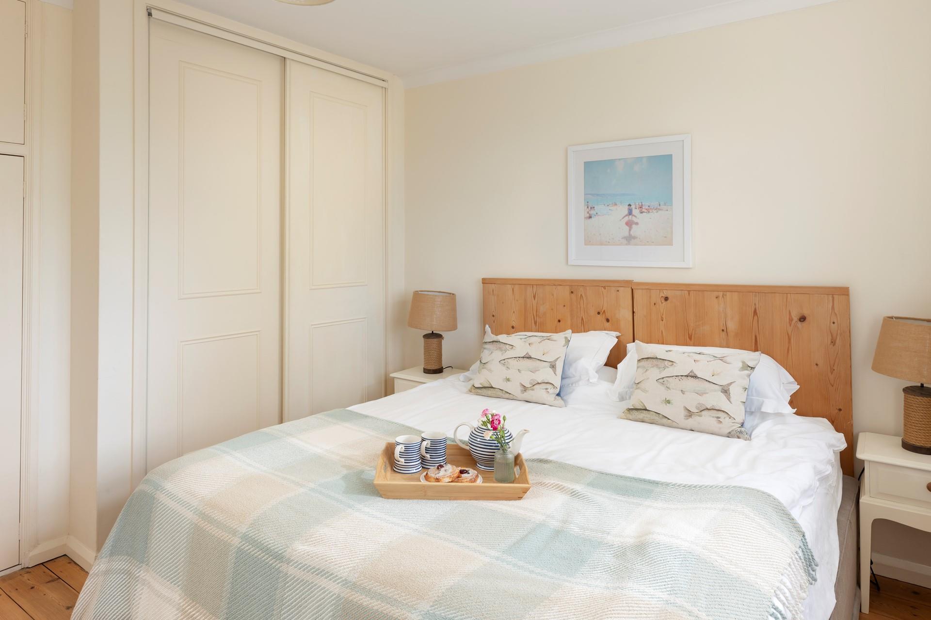 The bedrooms are simply decorated with neutral tones.