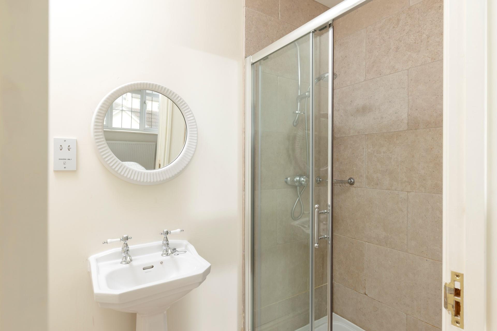 Wash the day away in the shower room.