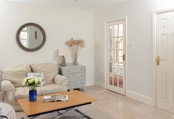 Get stuck into a good book in the sitting room.