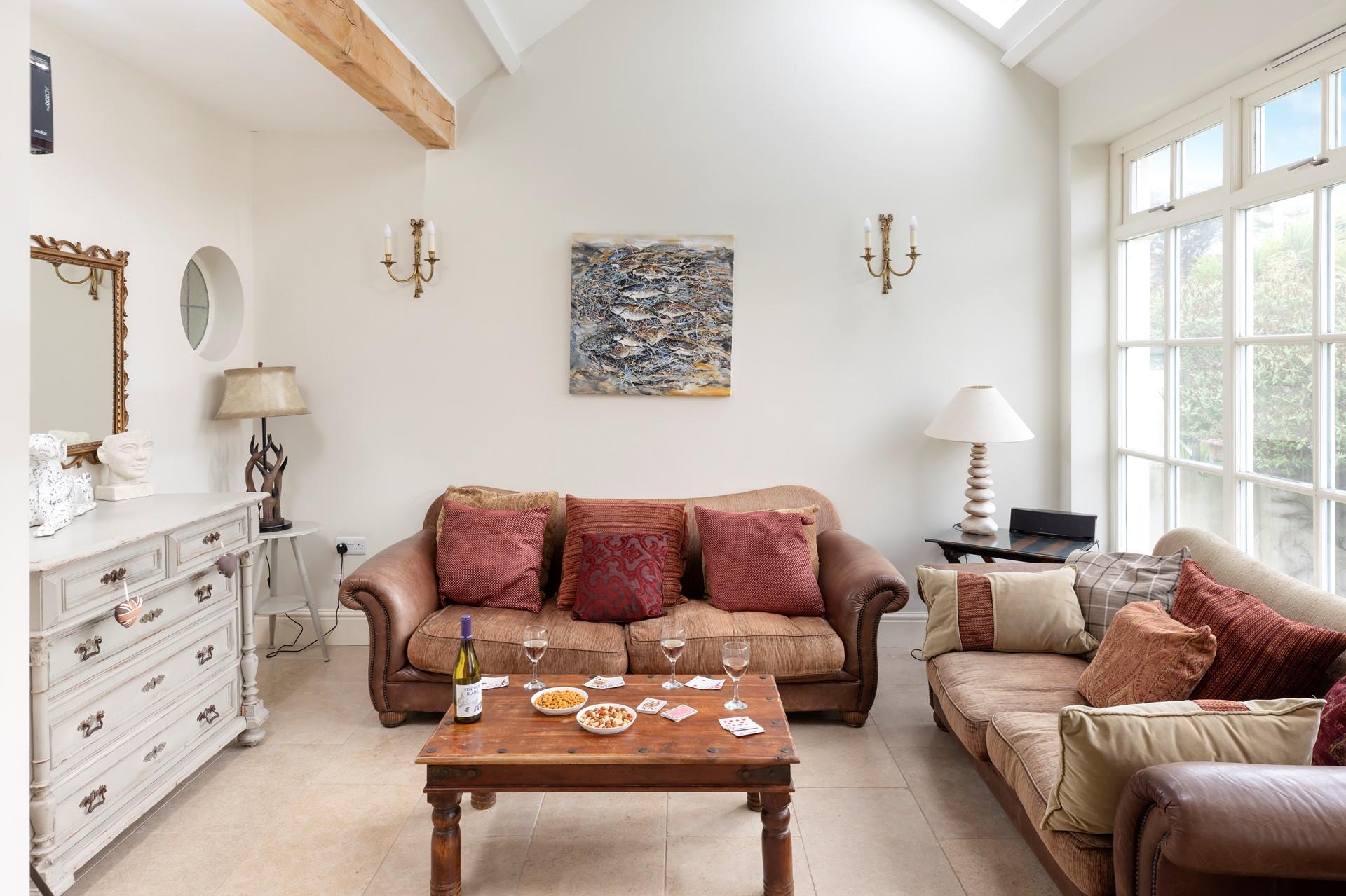 Beams and quirky furnishings add to the charm.