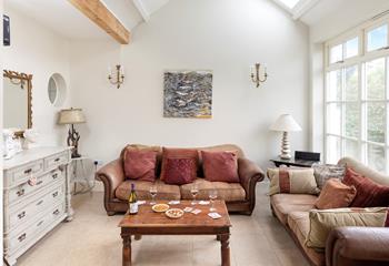 Beams and quirky furnishings add to the charm.