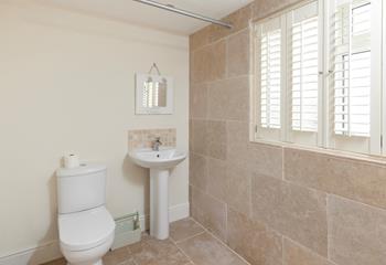 Wash off sandy toes in the shower after a day on Crooklets.