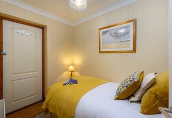 Bedroom 3 has a single bed perfect for young adults or children.