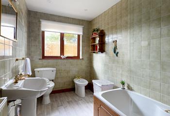 The family bathroom is ideal to chill out in a bubble bath after a long day.