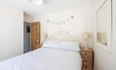 Bedroom 2 has a double bed to tuck into each evening. - Thumbnail Image