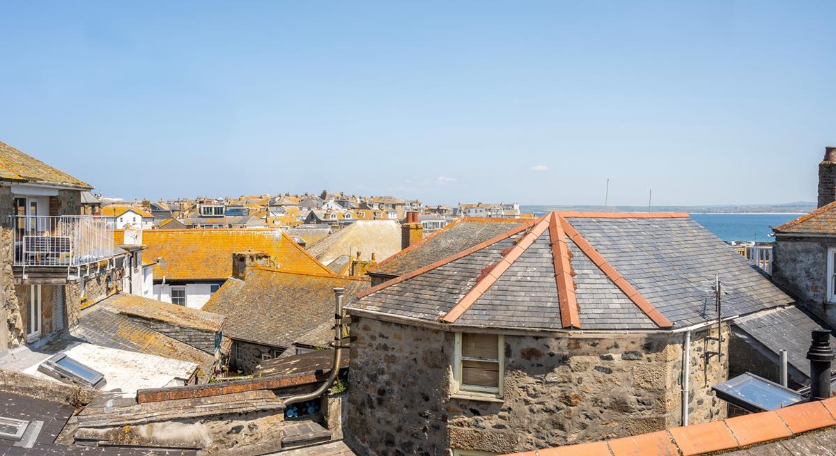 Sea glimpses across St Ives' quirky rooftops.