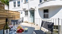 Tuck into a Cornish cream tea on the outdoor patio.