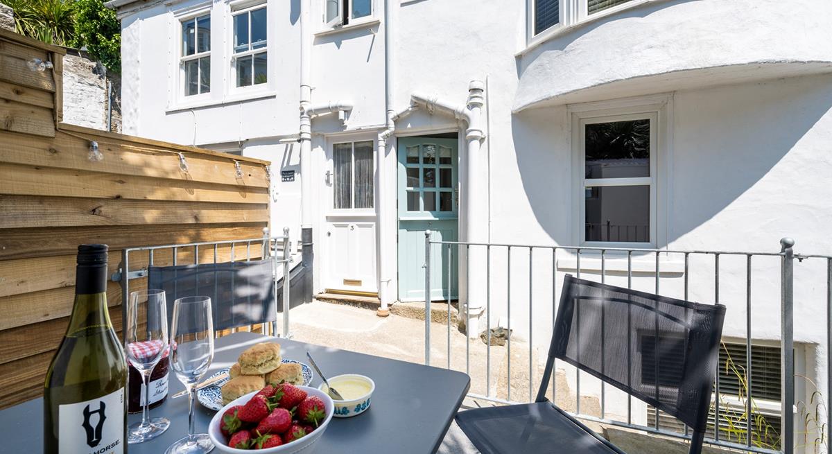 Tuck into a Cornish cream tea on the outdoor patio.