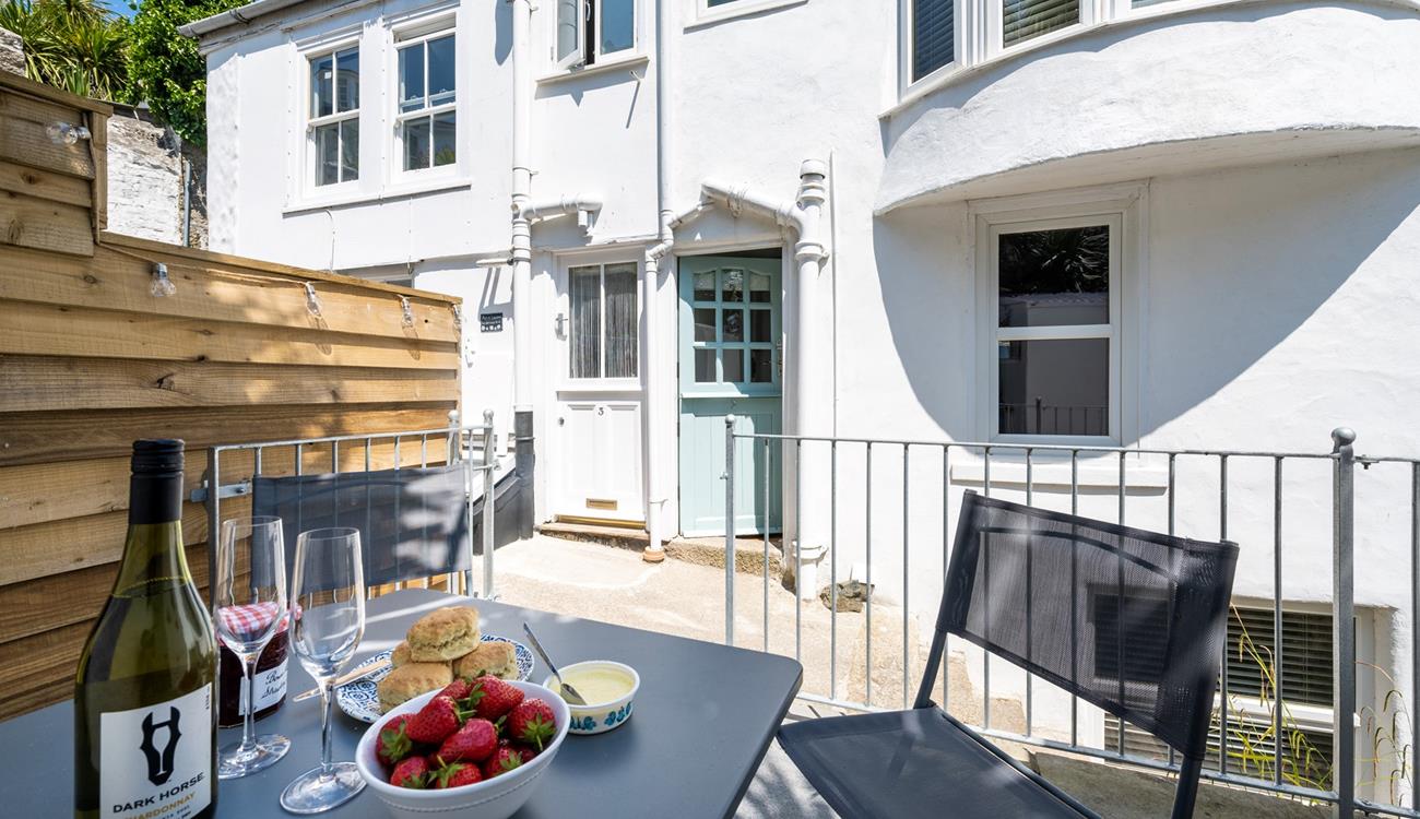 Tuck into a Cornish cream tea on the outdoor patio.