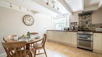 The kitchen is well-equipped for cooking tasty meals.
