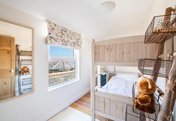 The bunk room has views across rooftops to the harbour.