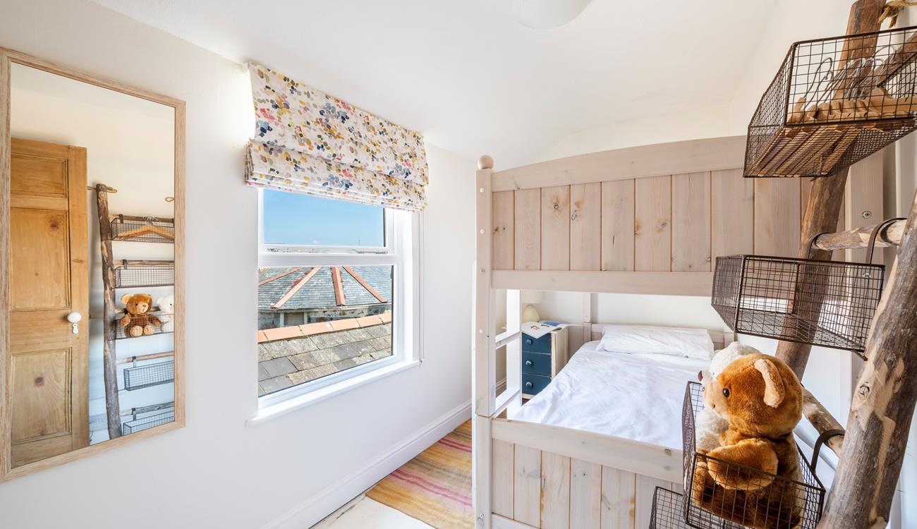 The bunk room has views across rooftops to the harbour.