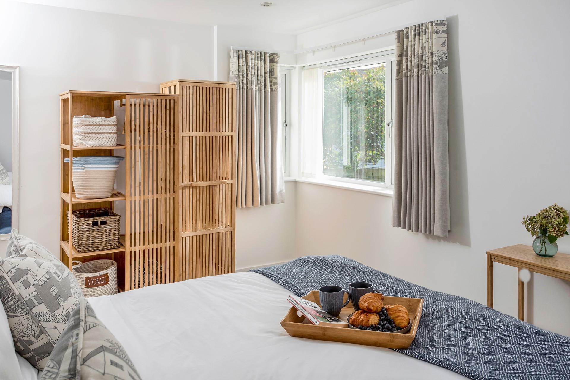 Spacious and luxurious, bedroom 1 makes for a calming space to relax.