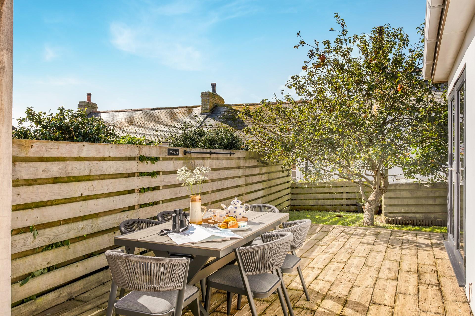 Take meals al fresco in the summer months.