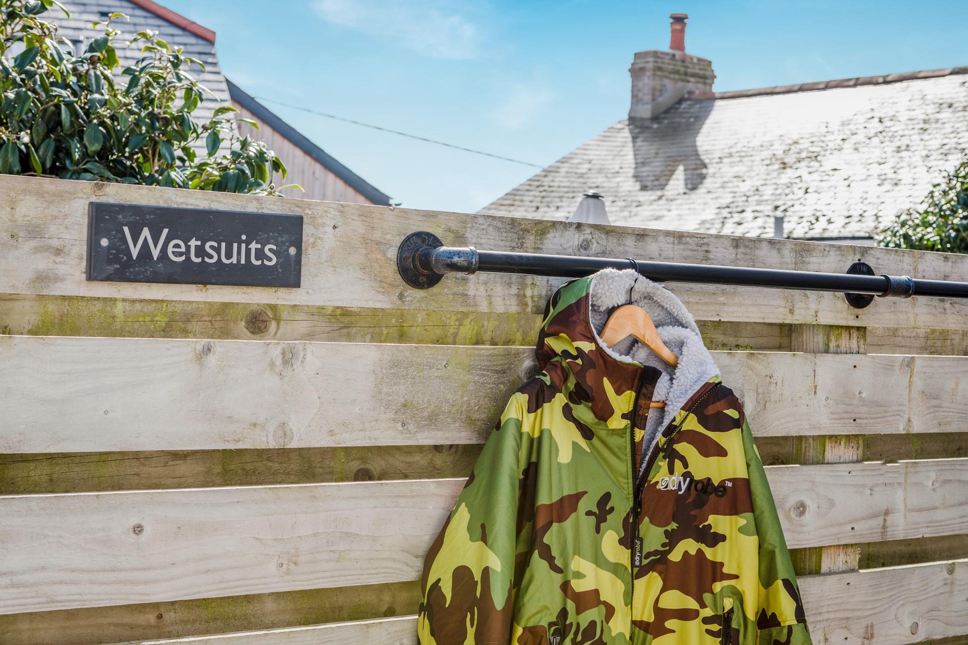 Hang wetsuits up to dry ready for another beach day.