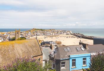 Stroll down into town and explore the independent shops and cafes in St Ives.