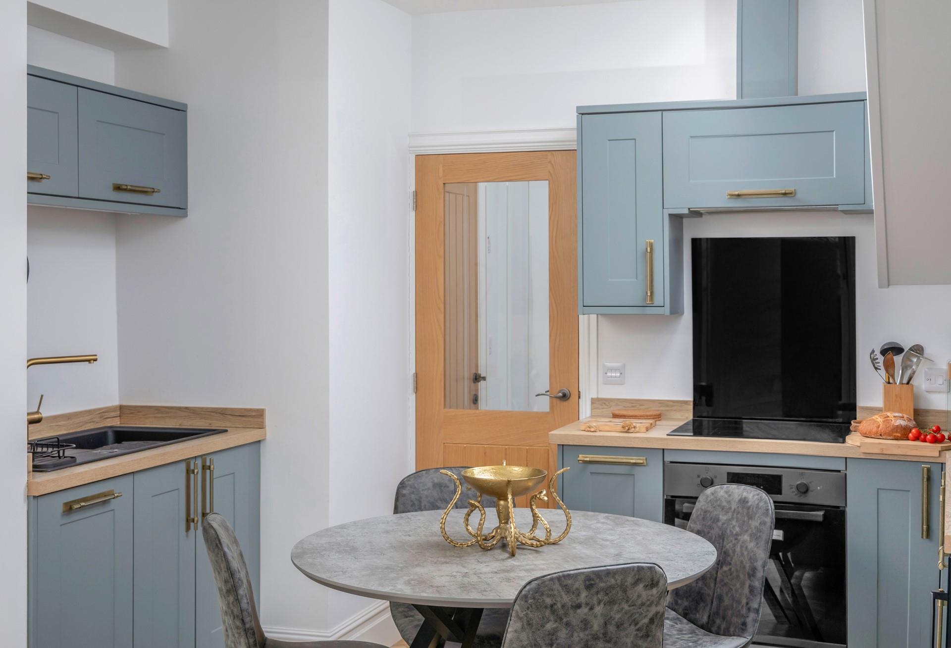 The kitchen is well-equipped for cooking tasty meals and preparing picnics.