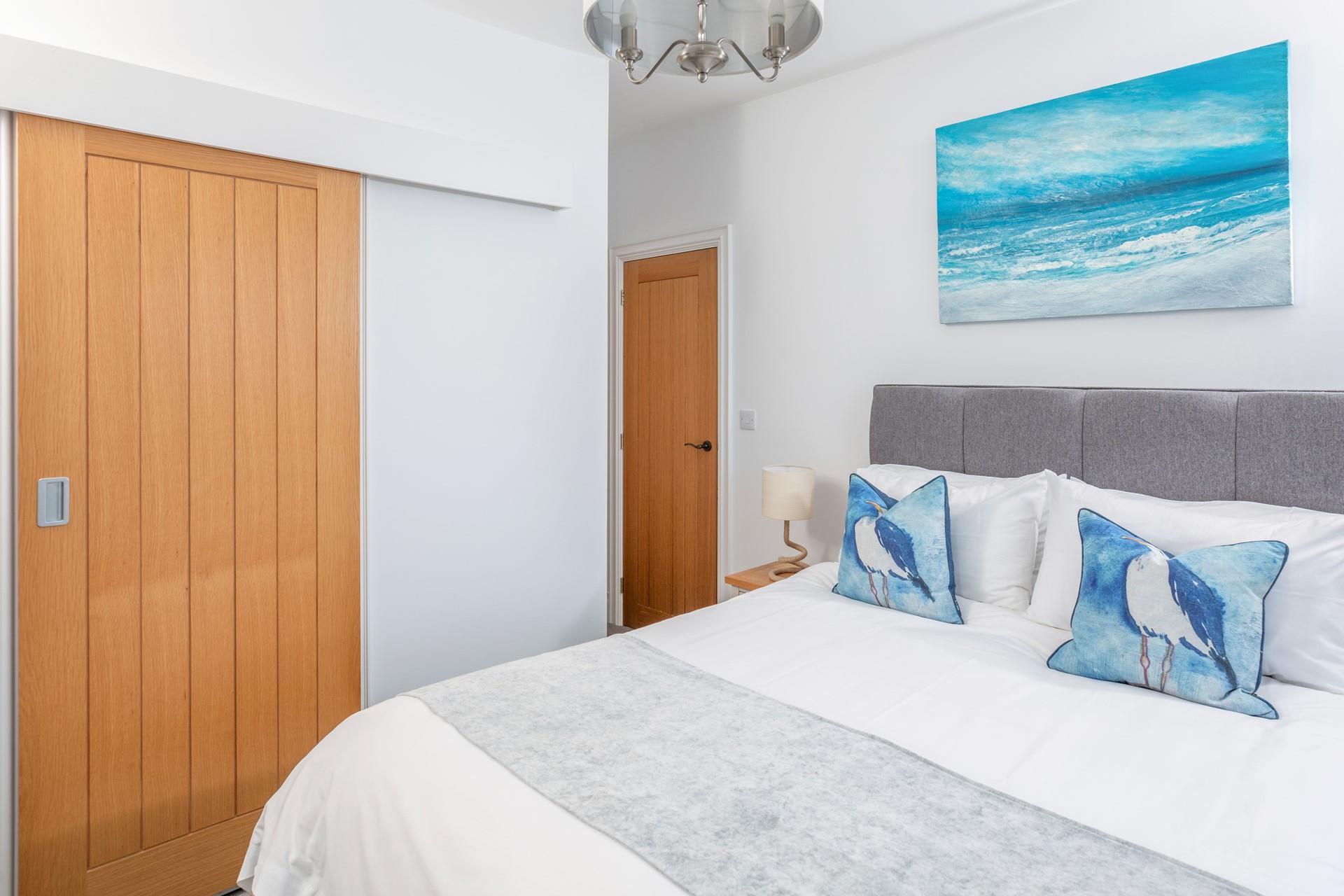 Climb into the soft sheets of the king size bed after a day spent exploring St Ives. 