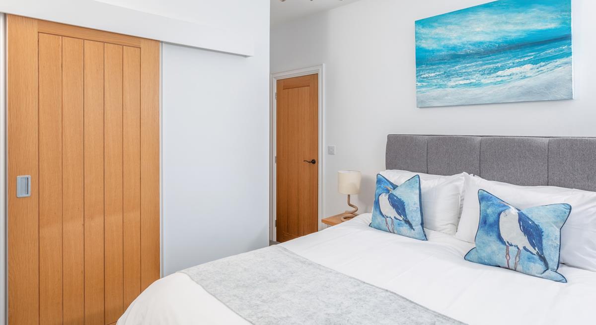 Climb into the soft sheets of the king size bed after a day spent exploring St Ives. 