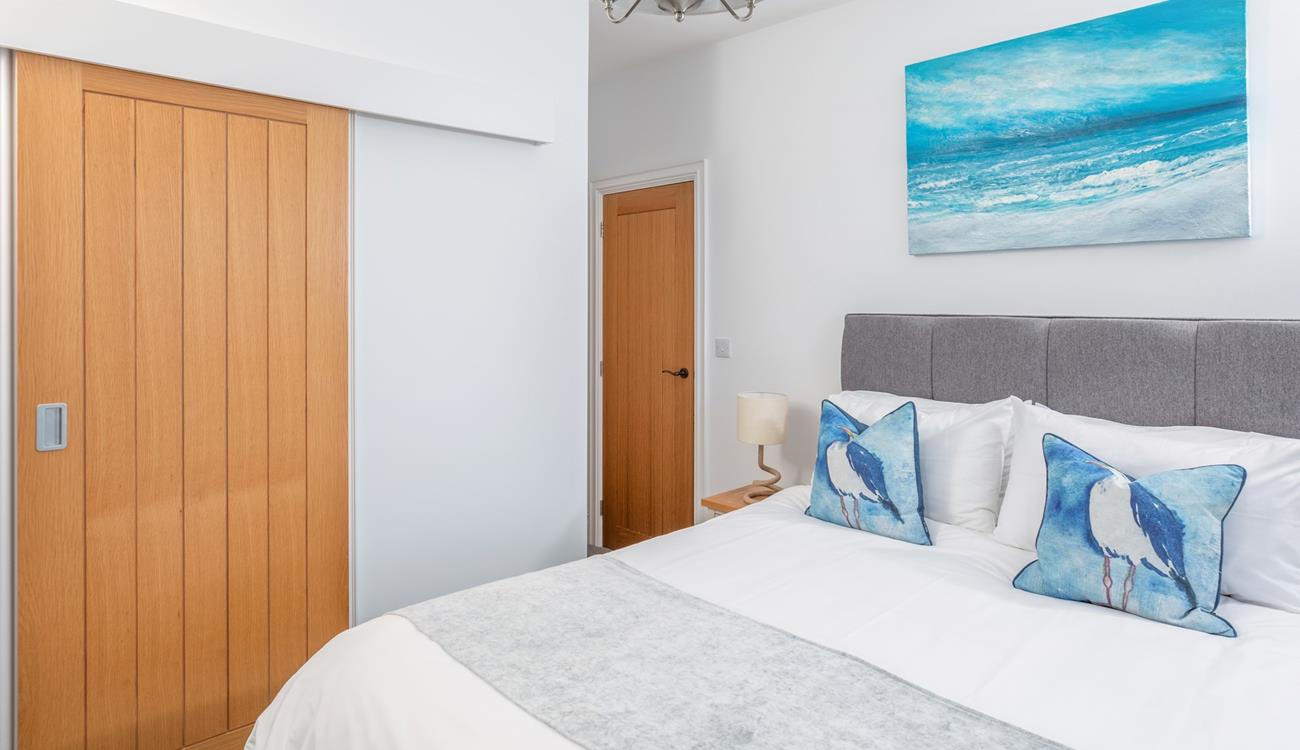 Climb into the soft sheets of the king size bed after a day spent exploring St Ives. 