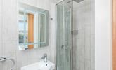 Step into the modern rainfall shower. - Thumbnail Image