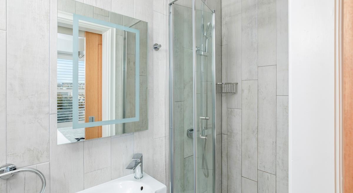 Step into the modern rainfall shower.