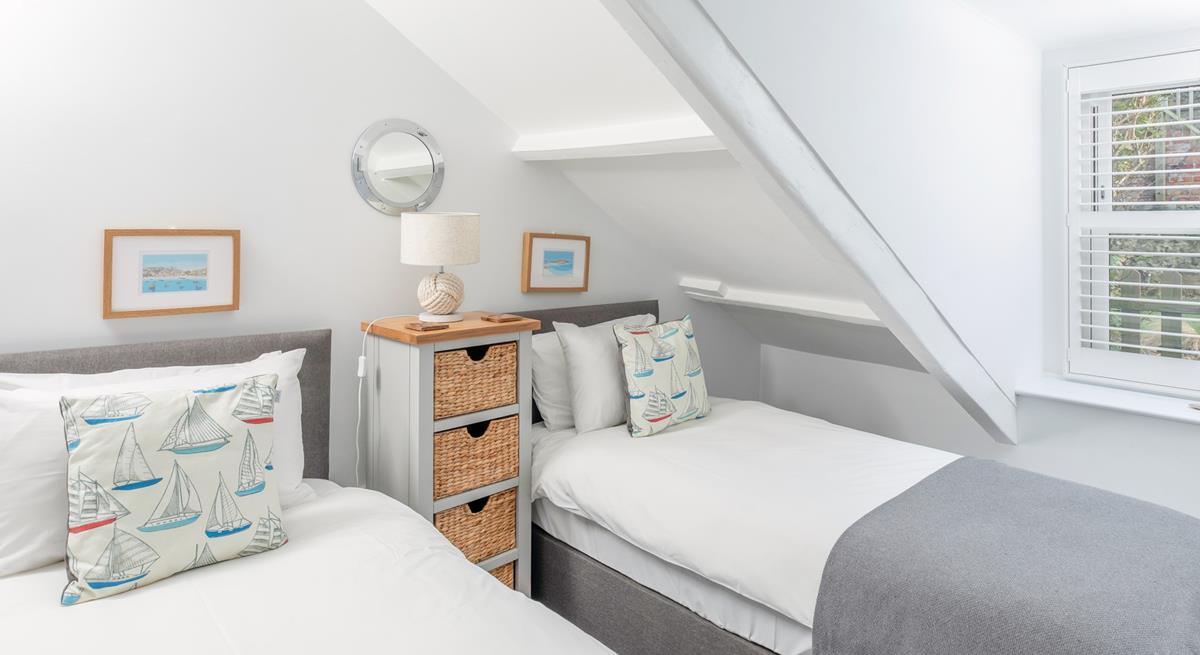 The twin beds are perfect for young adults or children.