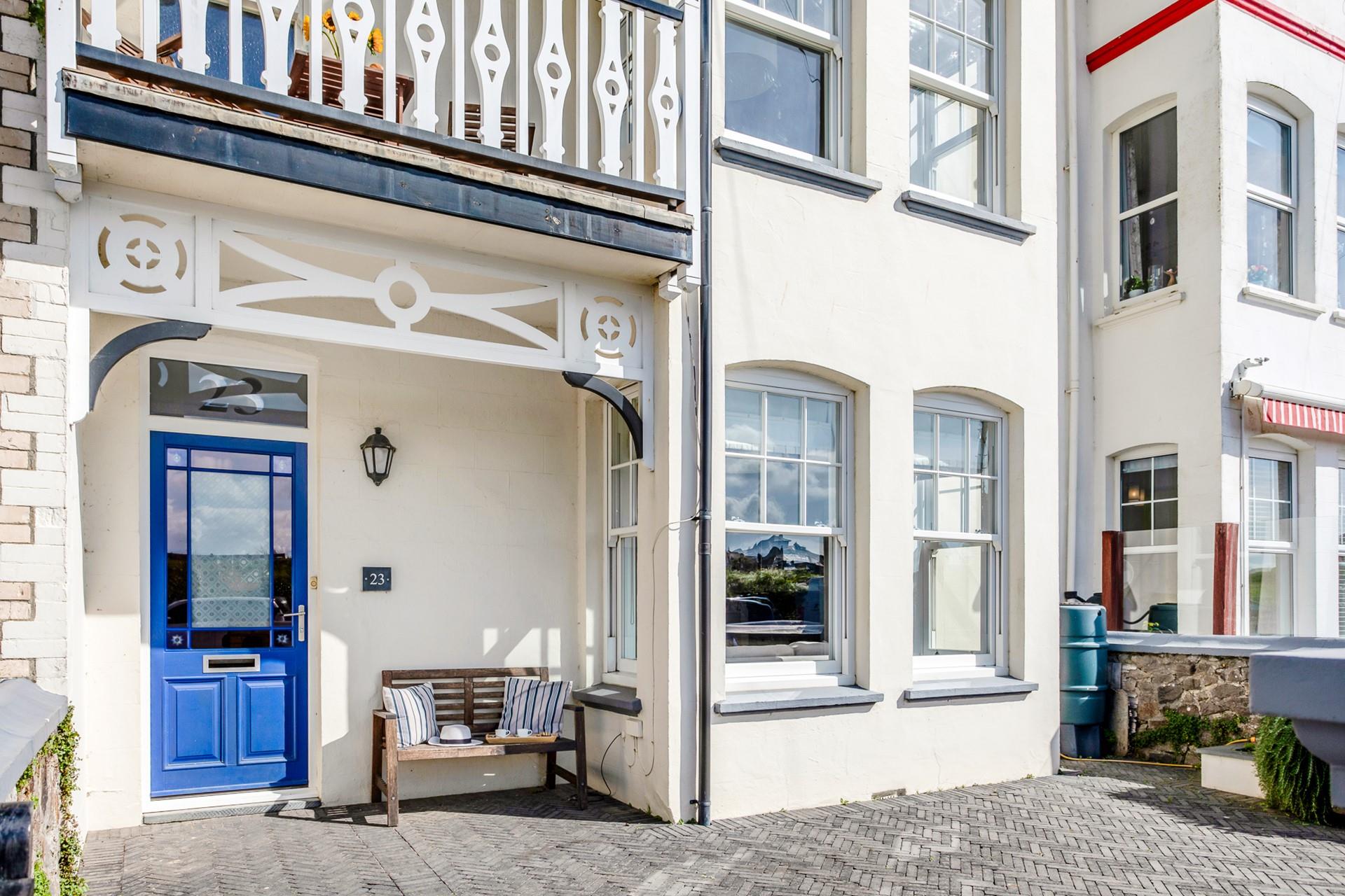 There is parking for two cars at the back of the house.