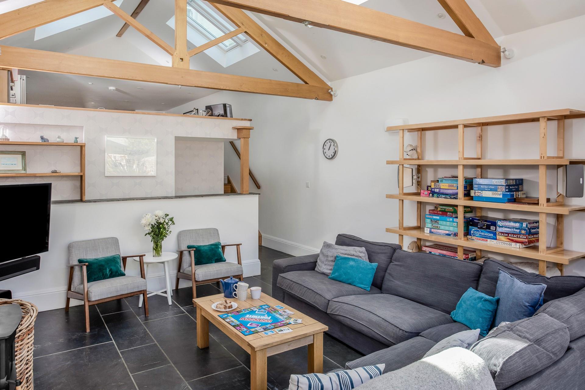 Snuggle up on the large sofa and enjoy some friendly rivalry with a board game.