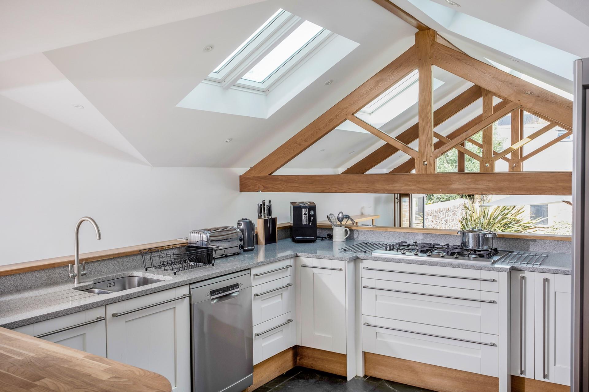 Prepare a hearty cooked breakfast in the modern kitchen.