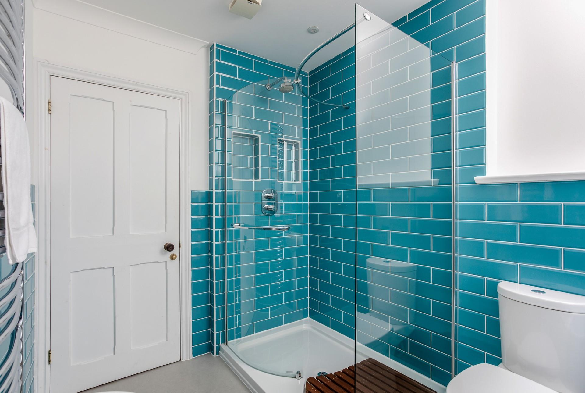 Wash off sandy toes in the shower after a beach day.