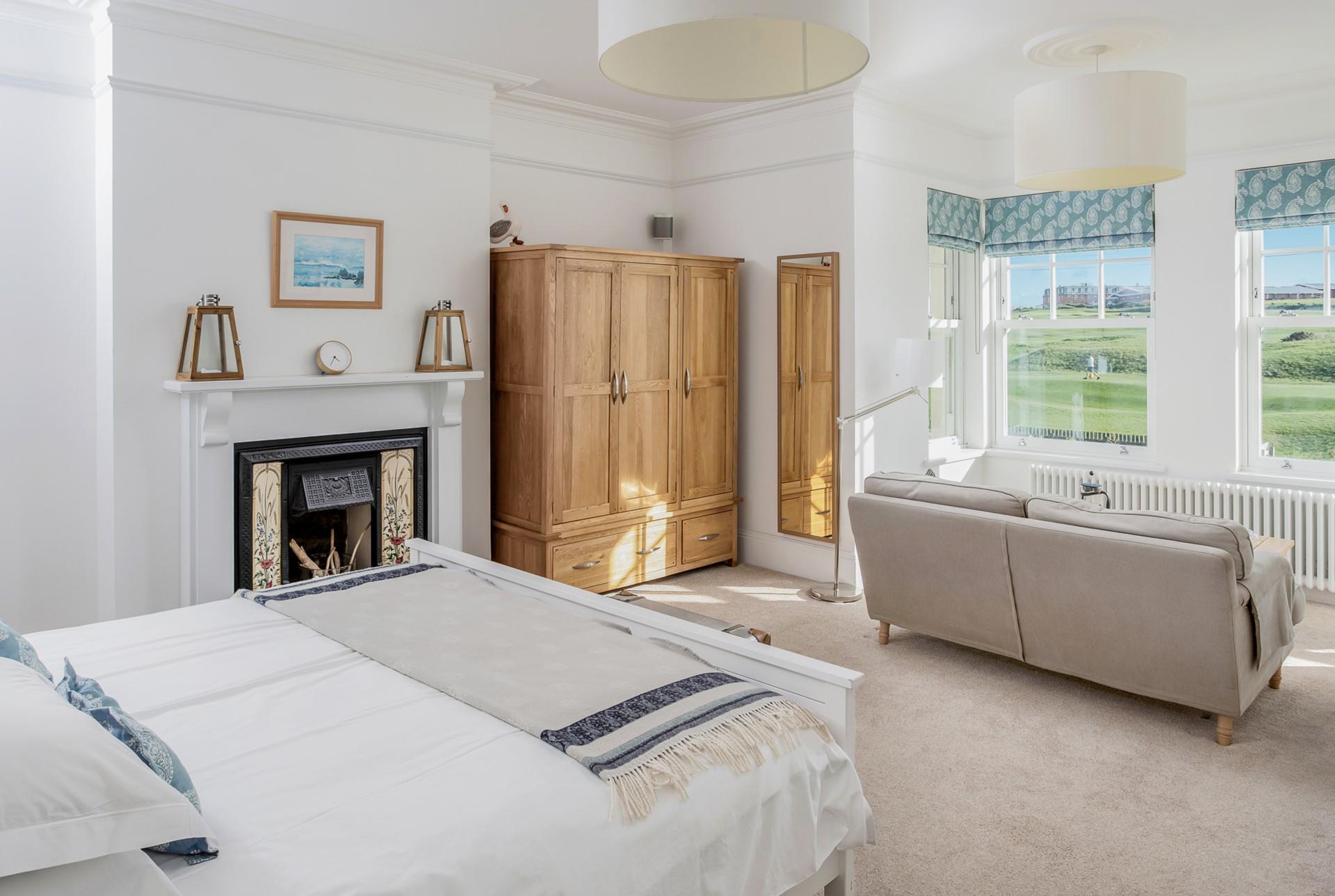 Wake up to views of the golf course and beyond.