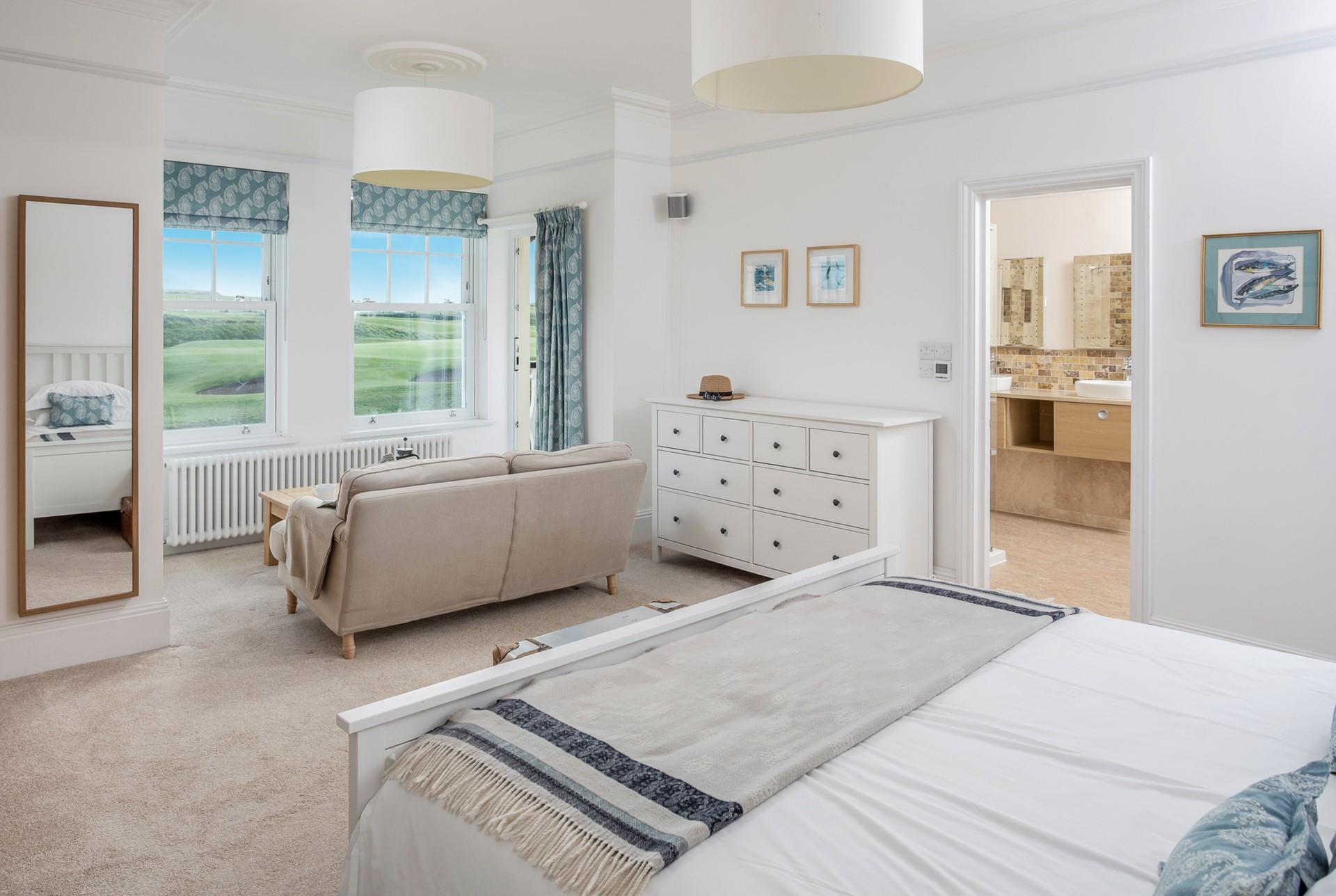 Wake up and wander into the en suite to get ready for the day.